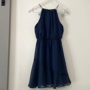 Woman’s blue polkadotted theme, extra small dress